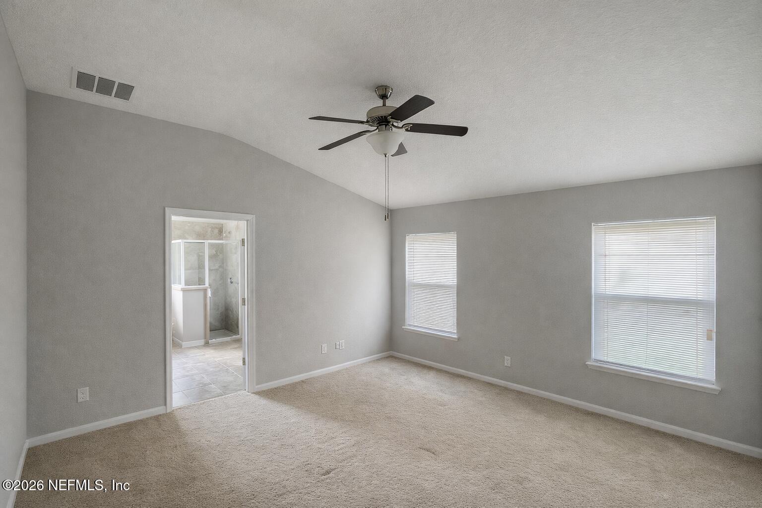 5937 Round Table Road Jacksonville, FL 32254 - Photo 4 of 10 a view of an empty room with a window