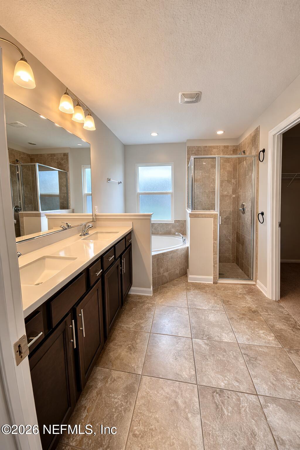 5937 Round Table Road Jacksonville, FL 32254 - Photo 5 of 10 a large bathroom with a sink and a large mirror