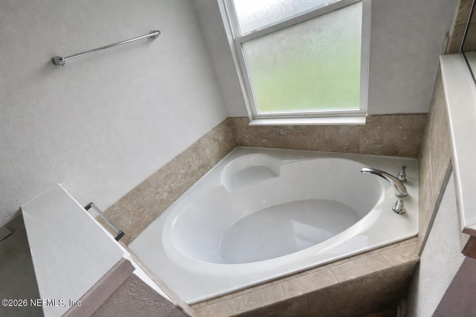 5937 Round Table Road Jacksonville, FL 32254 - Photo 6 of 10 a view of a bathtub in a bathroom