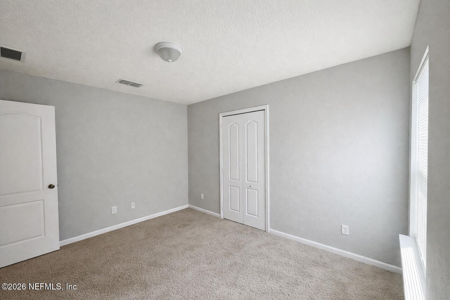 5937 Round Table Road Jacksonville, FL 32254 - Photo 7 of 10 a view of an empty room