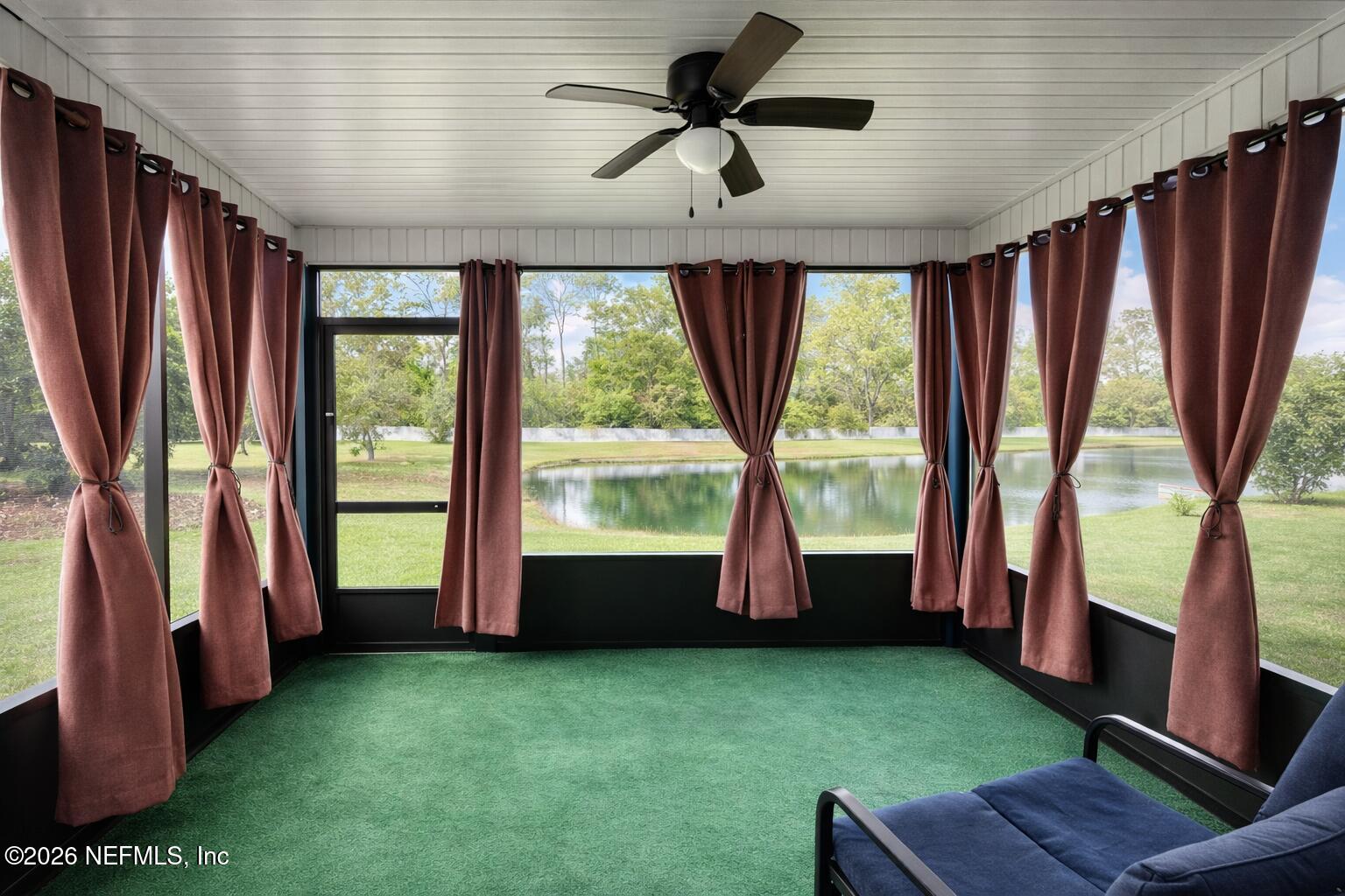 5937 Round Table Road Jacksonville, FL 32254 - Photo 9 of 10 a view of an empty room with window hardwood and furniture