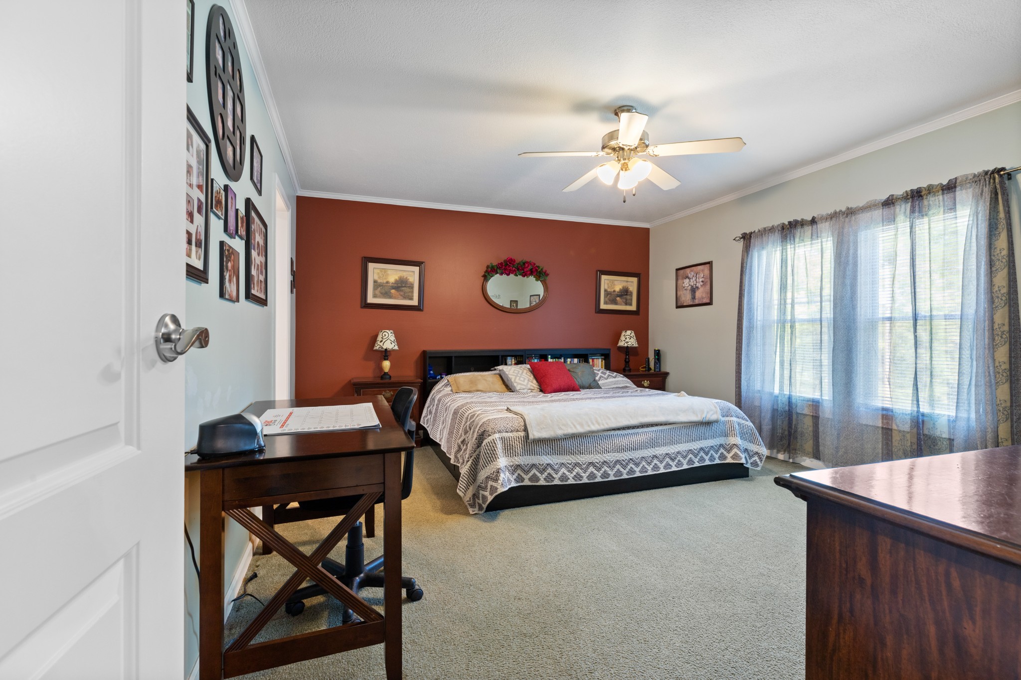 724 Plunders Creek Road Dickson, TN 37055 - Photo 11 of 29 a bedroom with bed and a chandelier