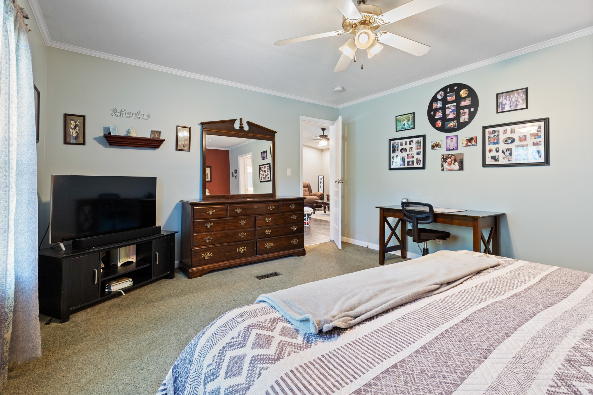 724 Plunders Creek Road Dickson, TN 37055 - Photo 12 of 29 a bedroom with a bed and a television in it