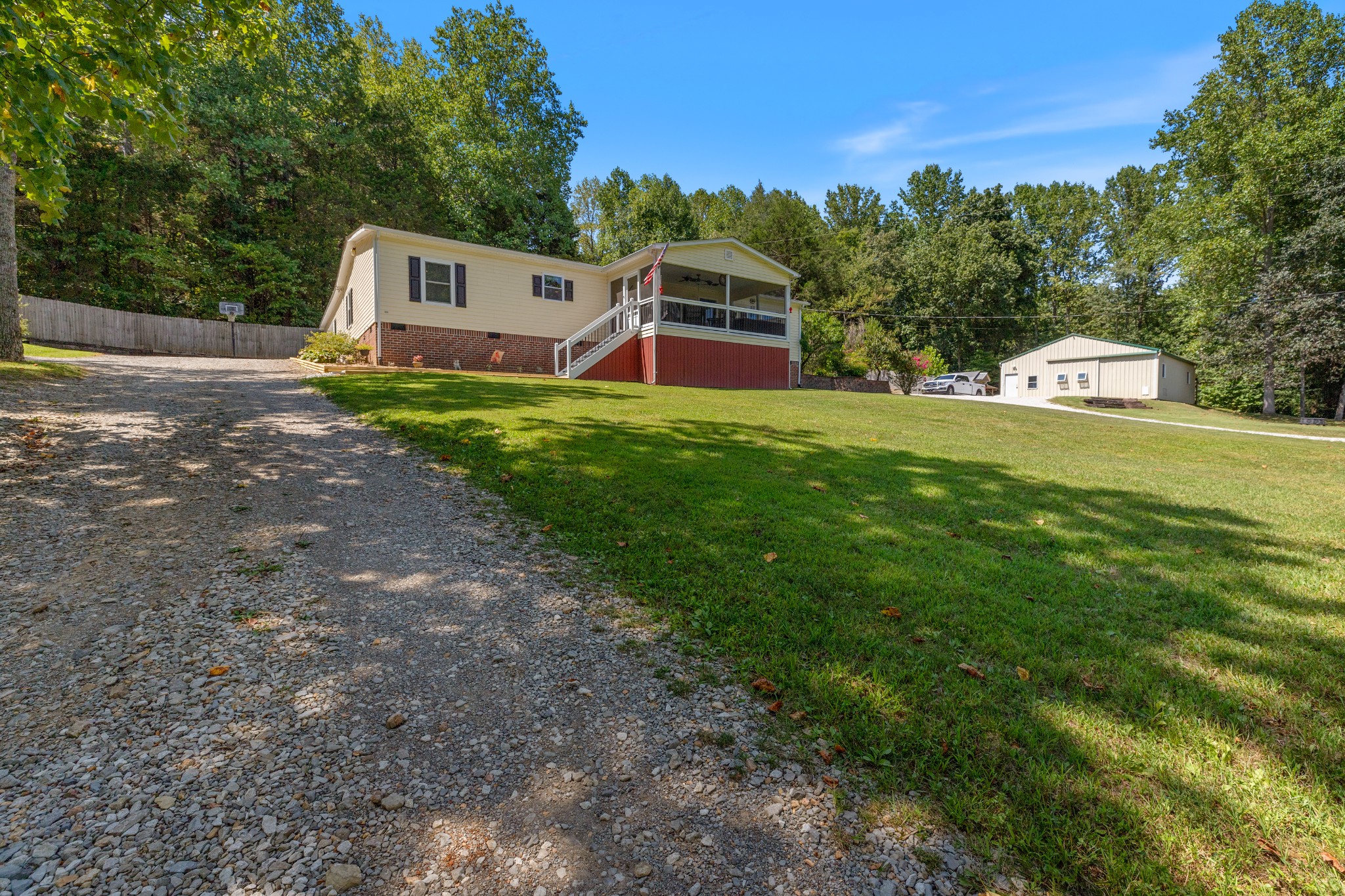 724 Plunders Creek Road Dickson, TN 37055 - Photo 21 of 29 a view of a house with a yard