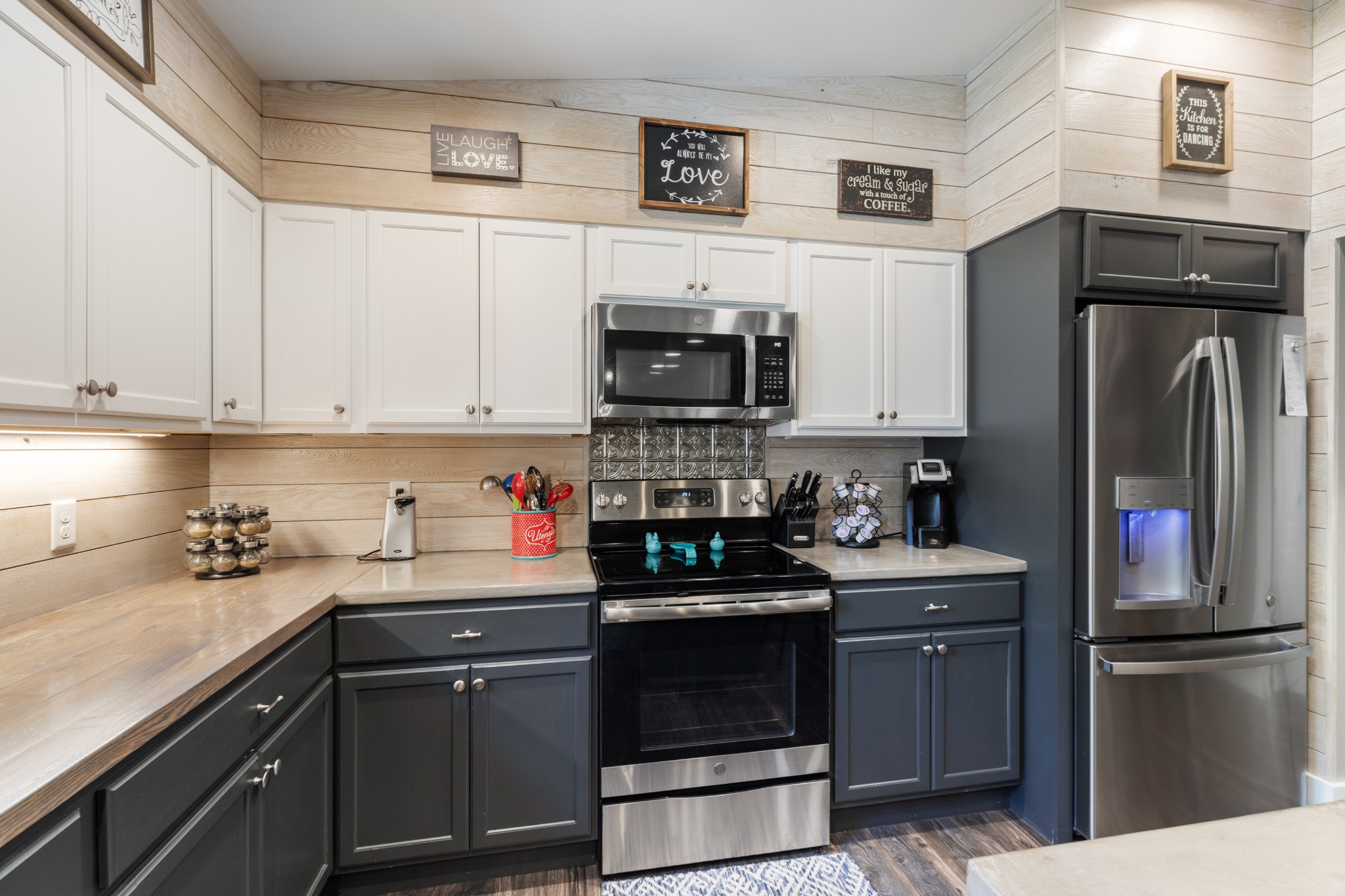 724 Plunders Creek Road Dickson, TN 37055 - Photo 6 of 29 a kitchen with a sink stove and refrigerator