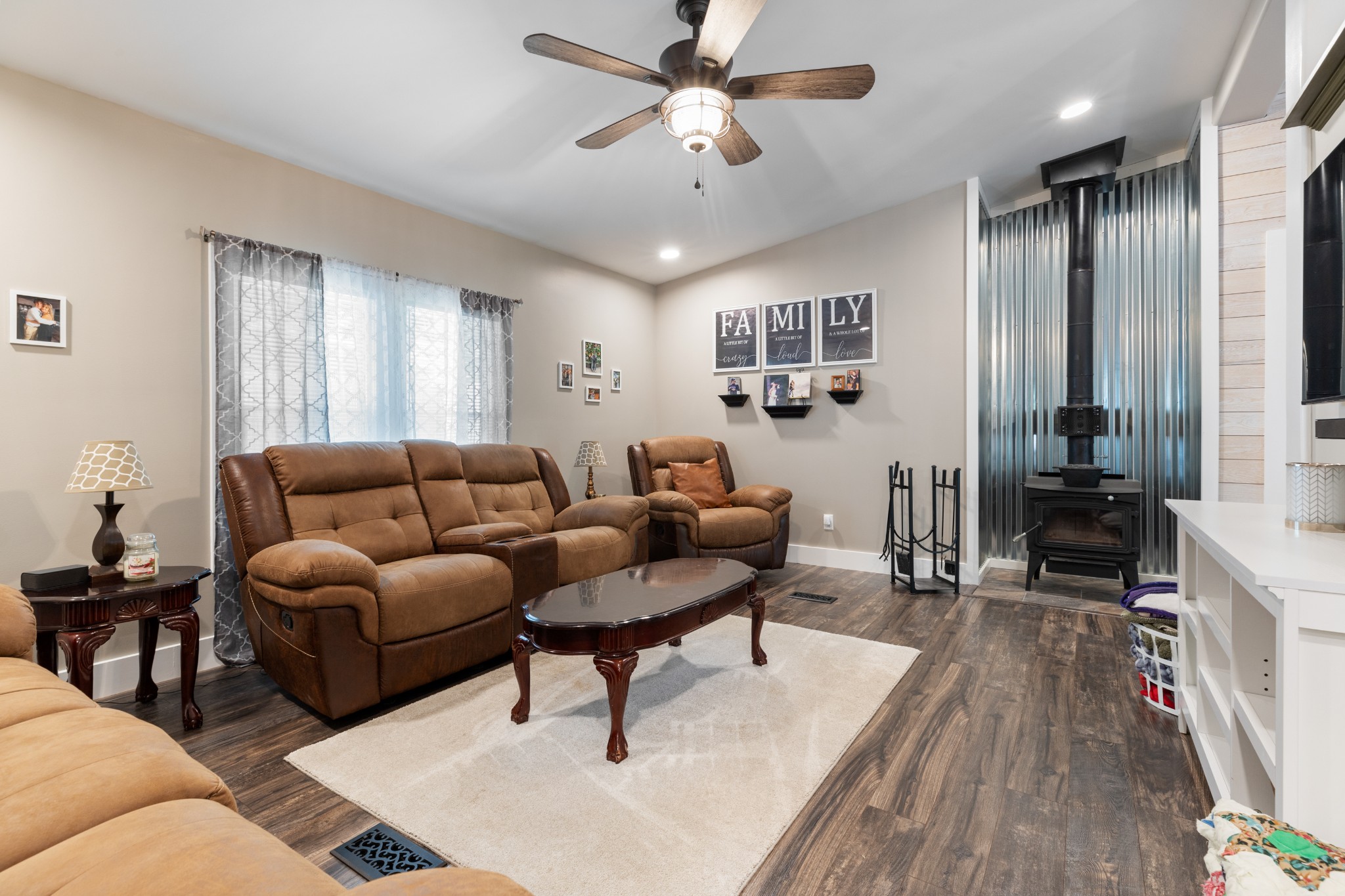 724 Plunders Creek Road Dickson, TN 37055 - Photo 10 of 29 a living room with furniture and a wooden floor