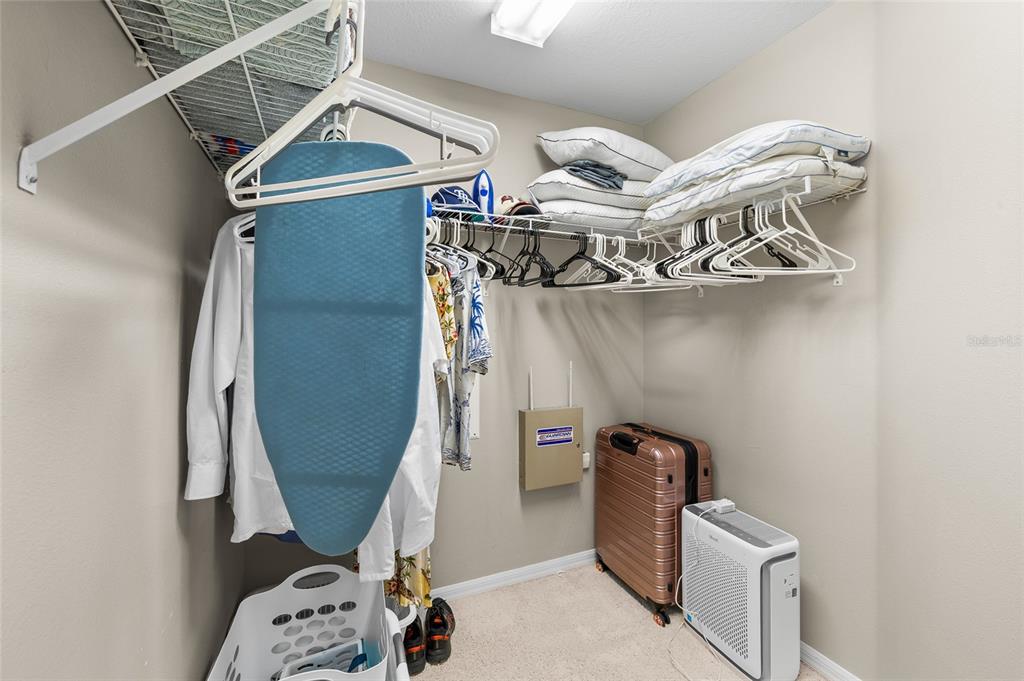 12113 Deertrack Loop Spring Hill, FL 34610 - Photo 21 of 31 a view of walk in closet with clothes and shoes
