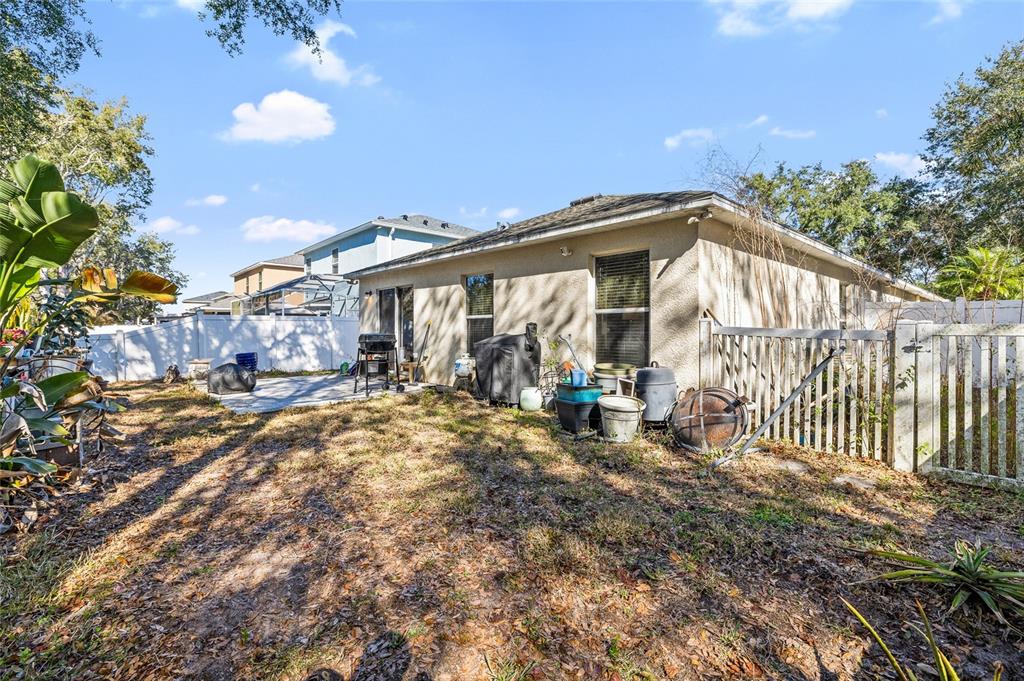 12113 Deertrack Loop Spring Hill, FL 34610 - Photo 24 of 31 a view of a house with backyard
