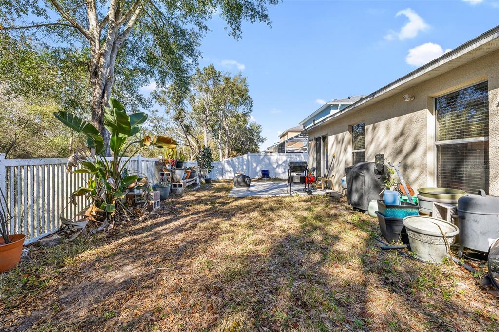 12113 Deertrack Loop Spring Hill, FL 34610 - Photo 25 of 31 a view of yard with patio
