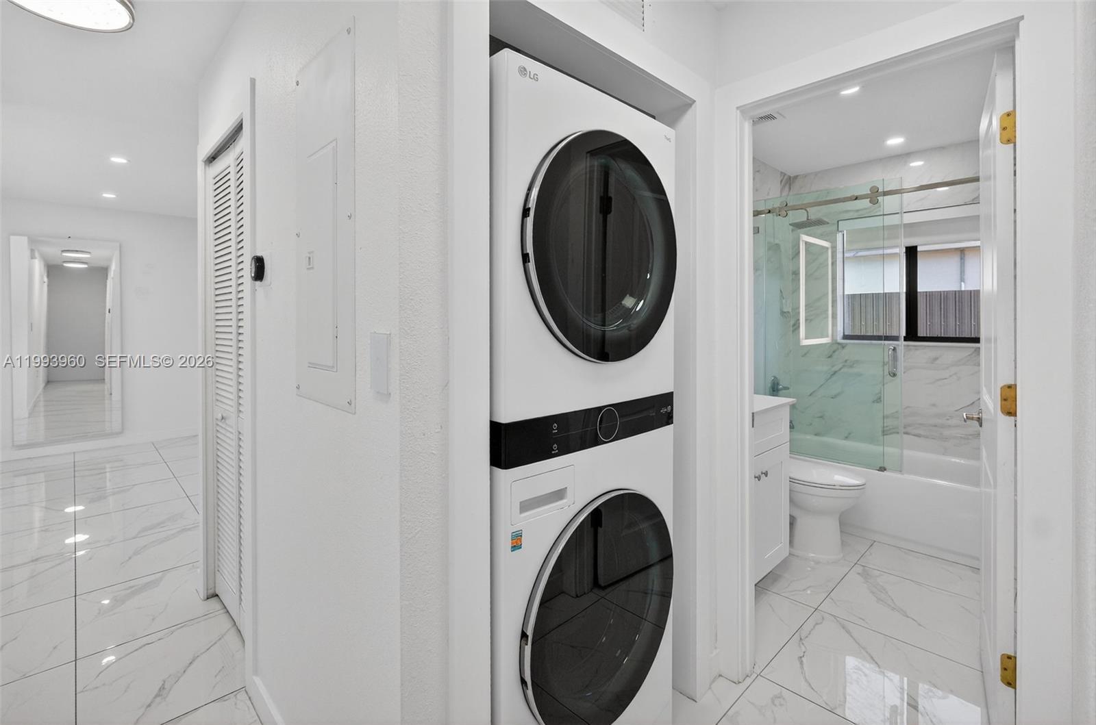 2492 Southwest 44th Street, Unit 2492 Miami, FL 33185 - Photo 15 of 34 a bathroom with a toilet and a sink