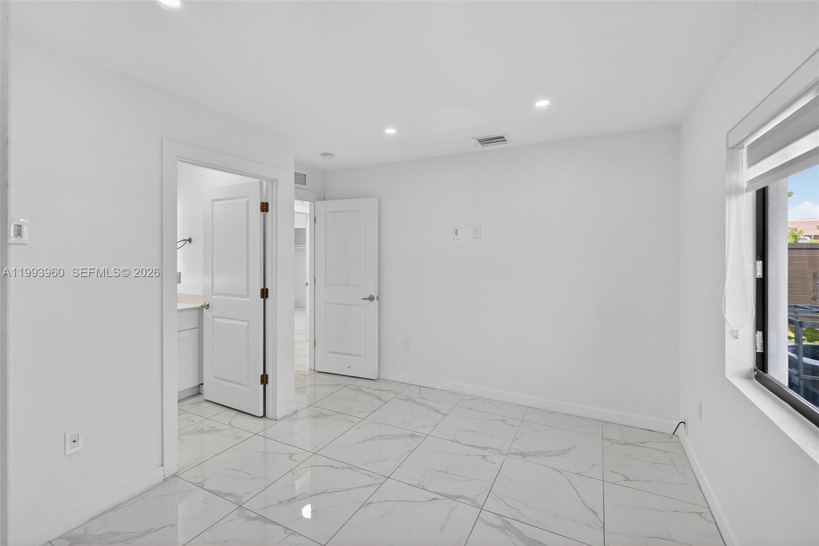 2492 Southwest 44th Street, Unit 2492 Miami, FL 33185 - Photo 23 of 34 a view of an empty room