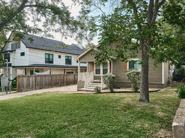 a backyard of a house with seating space