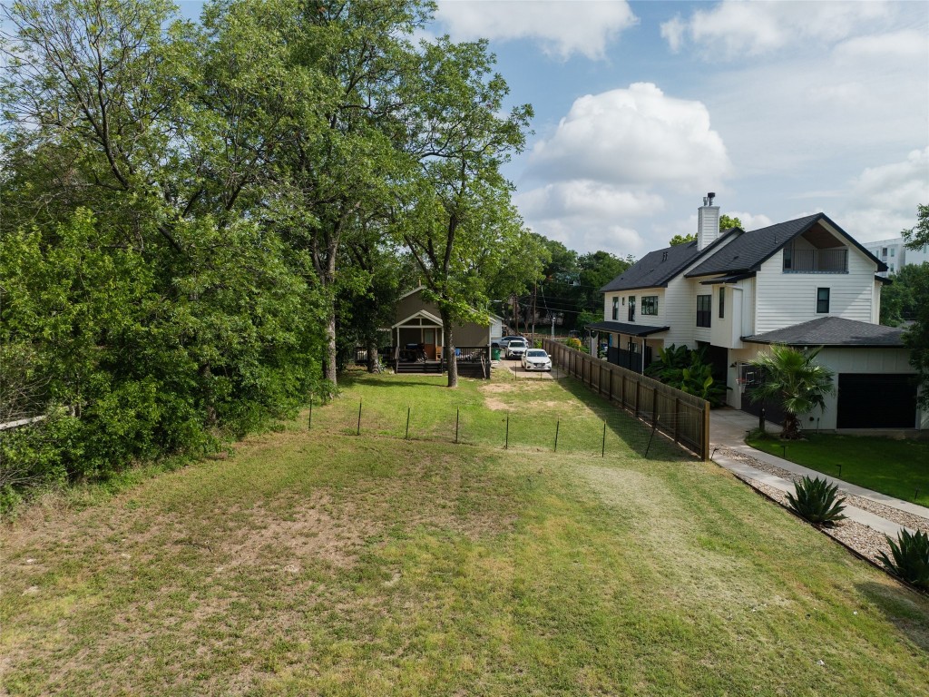 2817 East 22nd Street Austin, TX 78722 - Photo 8 of 18 a view of a house with swimming pool and sitting area
