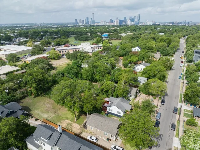 an aerial view of a city with lots of residential buildings