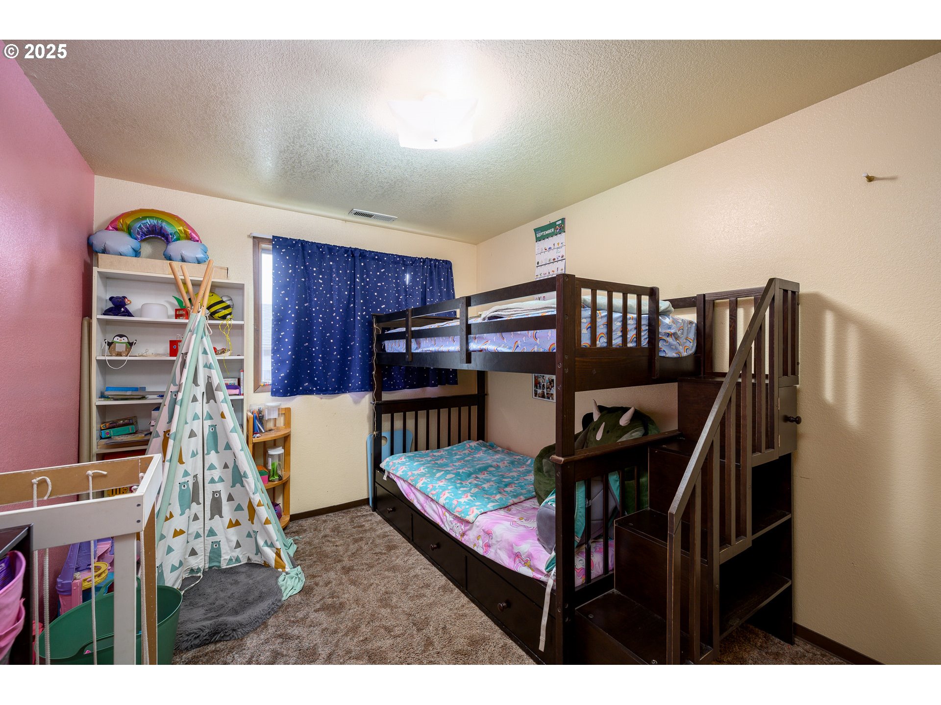 714 South Meridian Street Newberg, OR 97132 - Photo 16 of 35 a bedroom with furniture and wooden floor