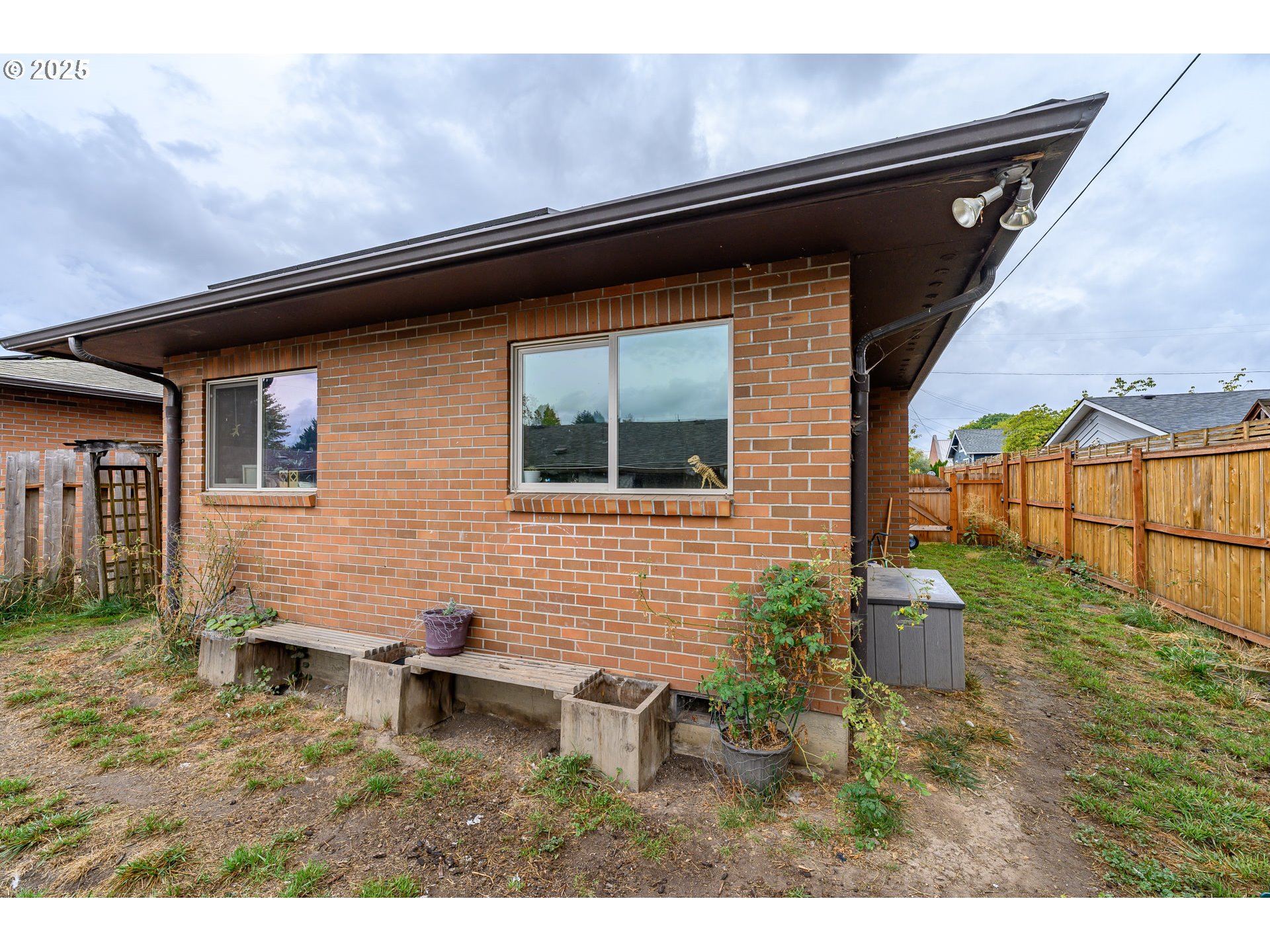 714 South Meridian Street Newberg, OR 97132 - Photo 7 of 35 a backyard of a house with seating space