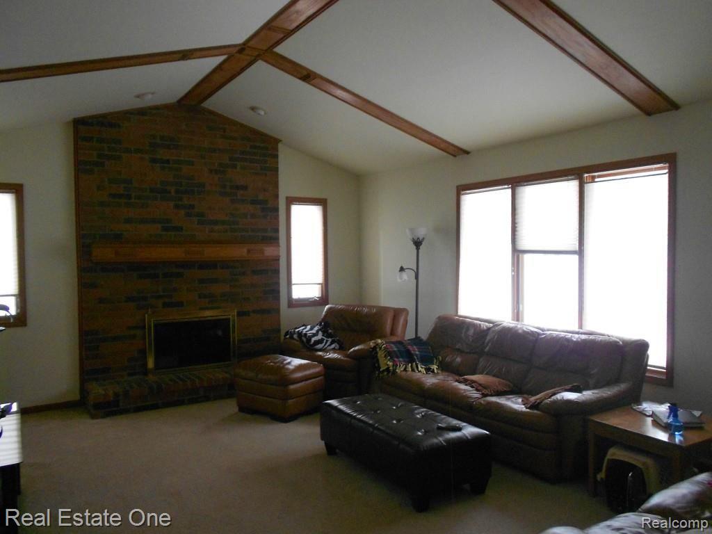 2110 Clinton View Circle Rochester, MI 48309 - Photo 6 of 15 Family rm with fireplace, wet bar and cathedral ceiling