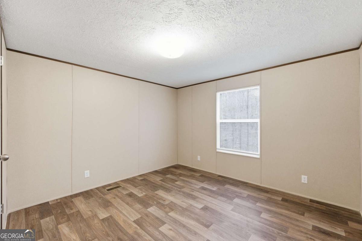 2232 Grandview Road Jasper, GA 30143 - Photo 13 of 29 an empty room with a window