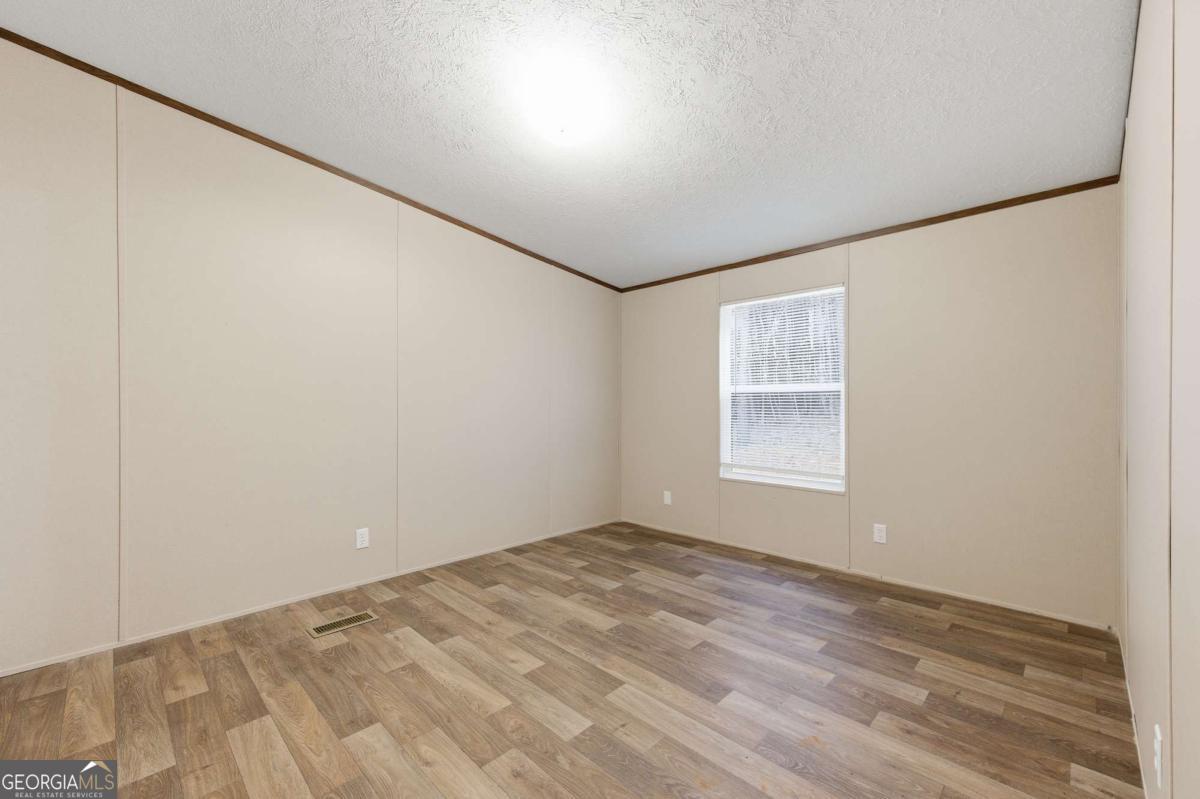 2232 Grandview Road Jasper, GA 30143 - Photo 17 of 29 an empty room with a window