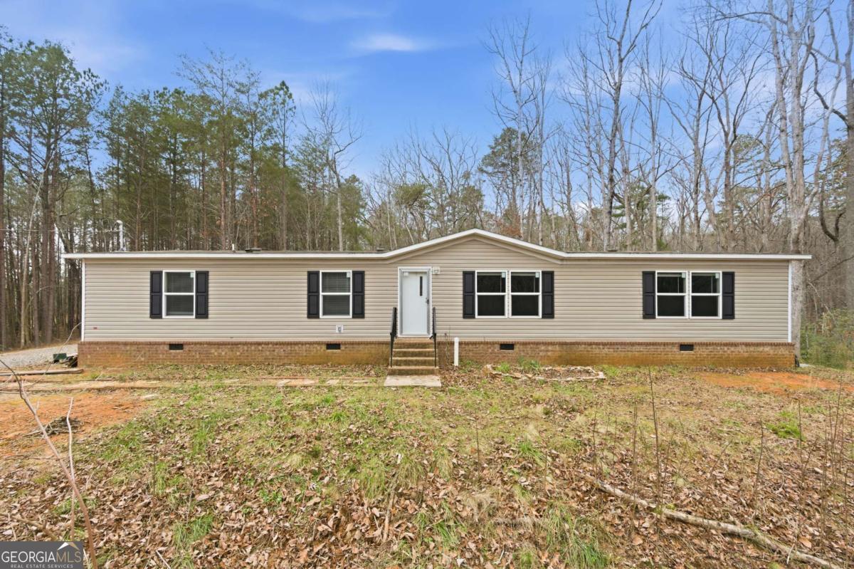 2232 Grandview Road Jasper, GA 30143 - Photo 25 of 29 a front view of a house with a yard