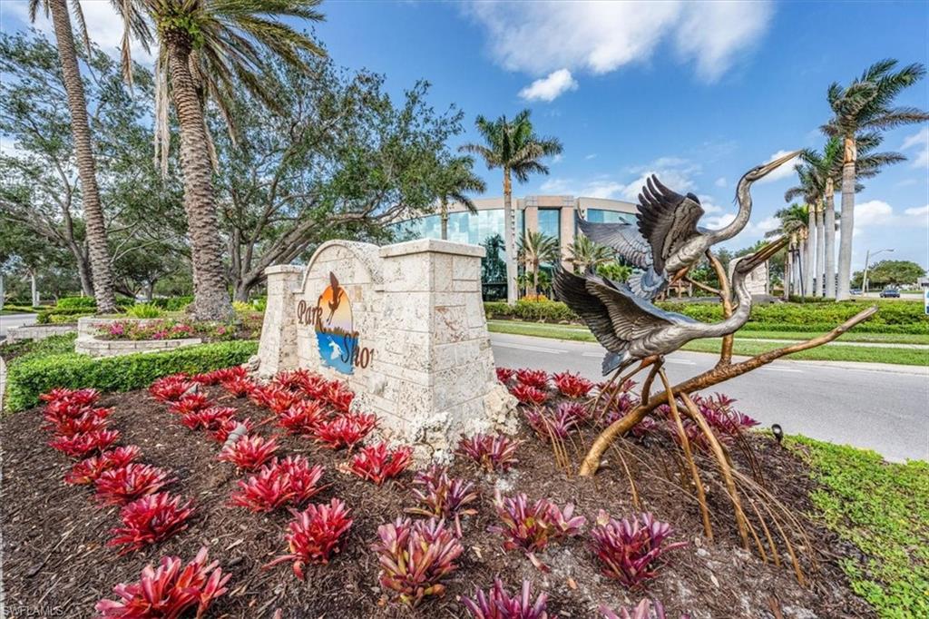 4228 Crayton Road Naples, FL 34103 - Photo 11 of 13 a view of a park with plants and palm trees