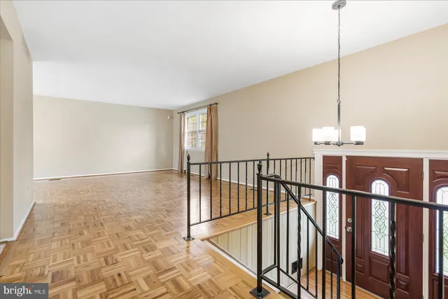 a view of a hallway with windows