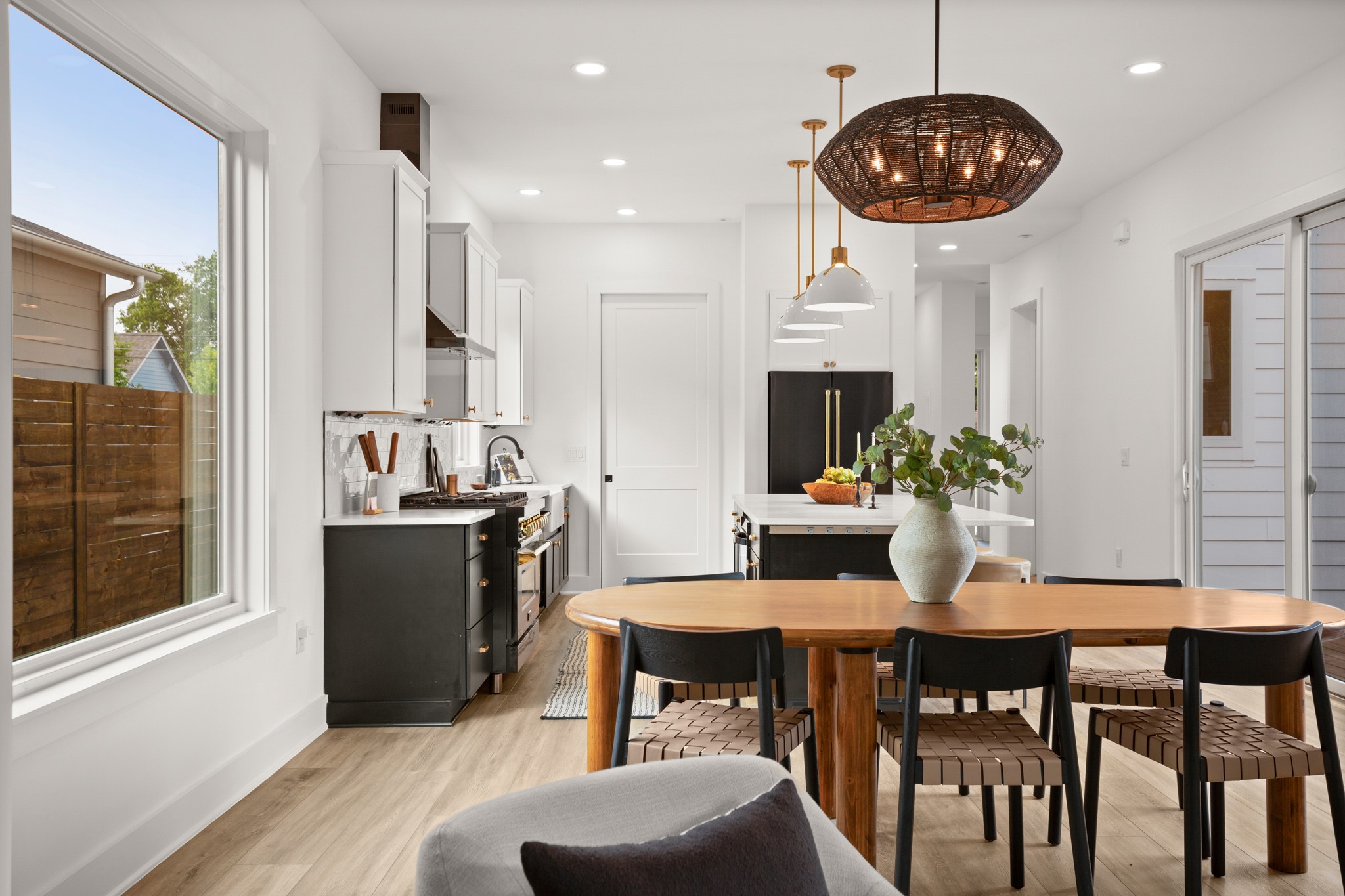 1912 Madison Avenue Austin, TX 78757 - Photo 12 of 17 Dining space featuring light wood-type flooring, a chandelier, and recessed lighting