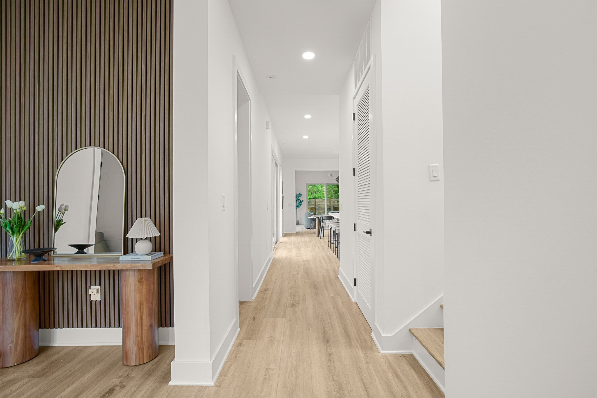 1912 Madison Avenue Austin, TX 78757 - Photo 13 of 17 Corridor with recessed lighting and light wood finished floors