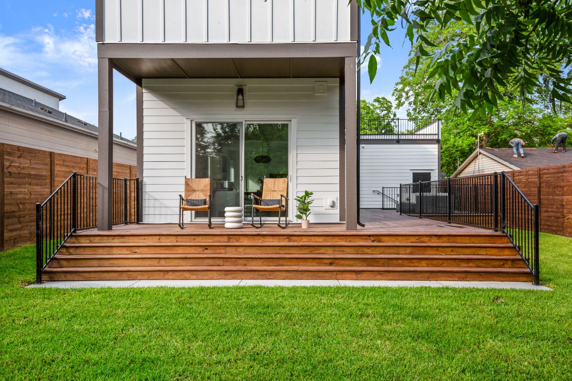 1912 Madison Avenue Austin, TX 78757 - Photo 16 of 17 a view of a house with a backyard and a patio
