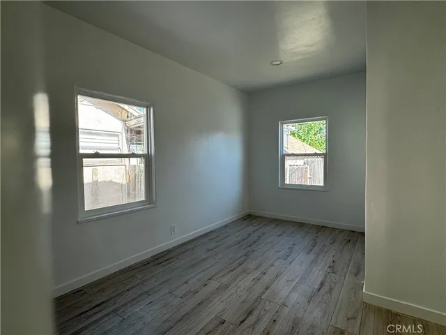 an empty room that has a window