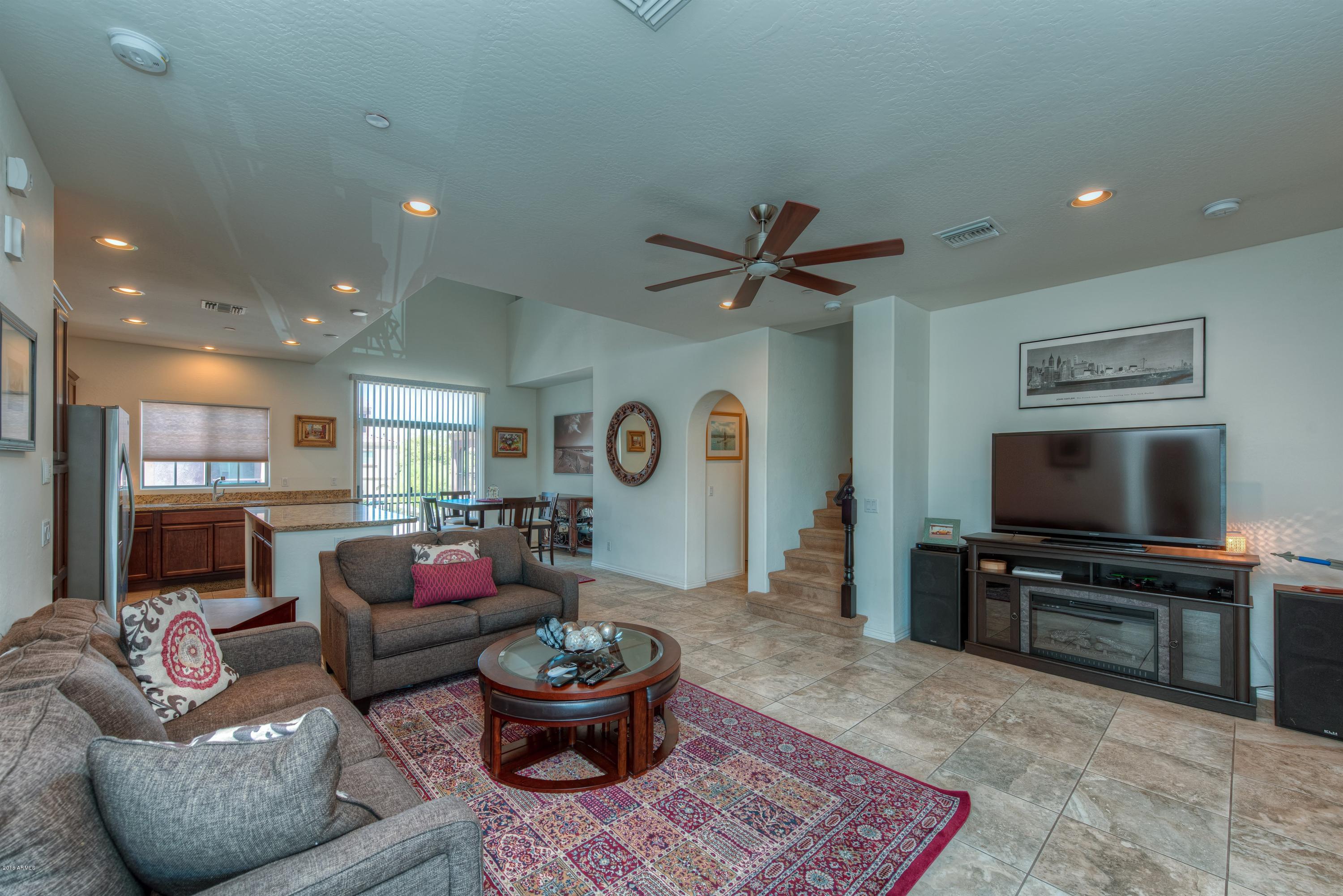 3935 East Rough Rider Road, Unit 1257 Phoenix, AZ 85050 - Photo 12 of 21 006_Living & Dining Room