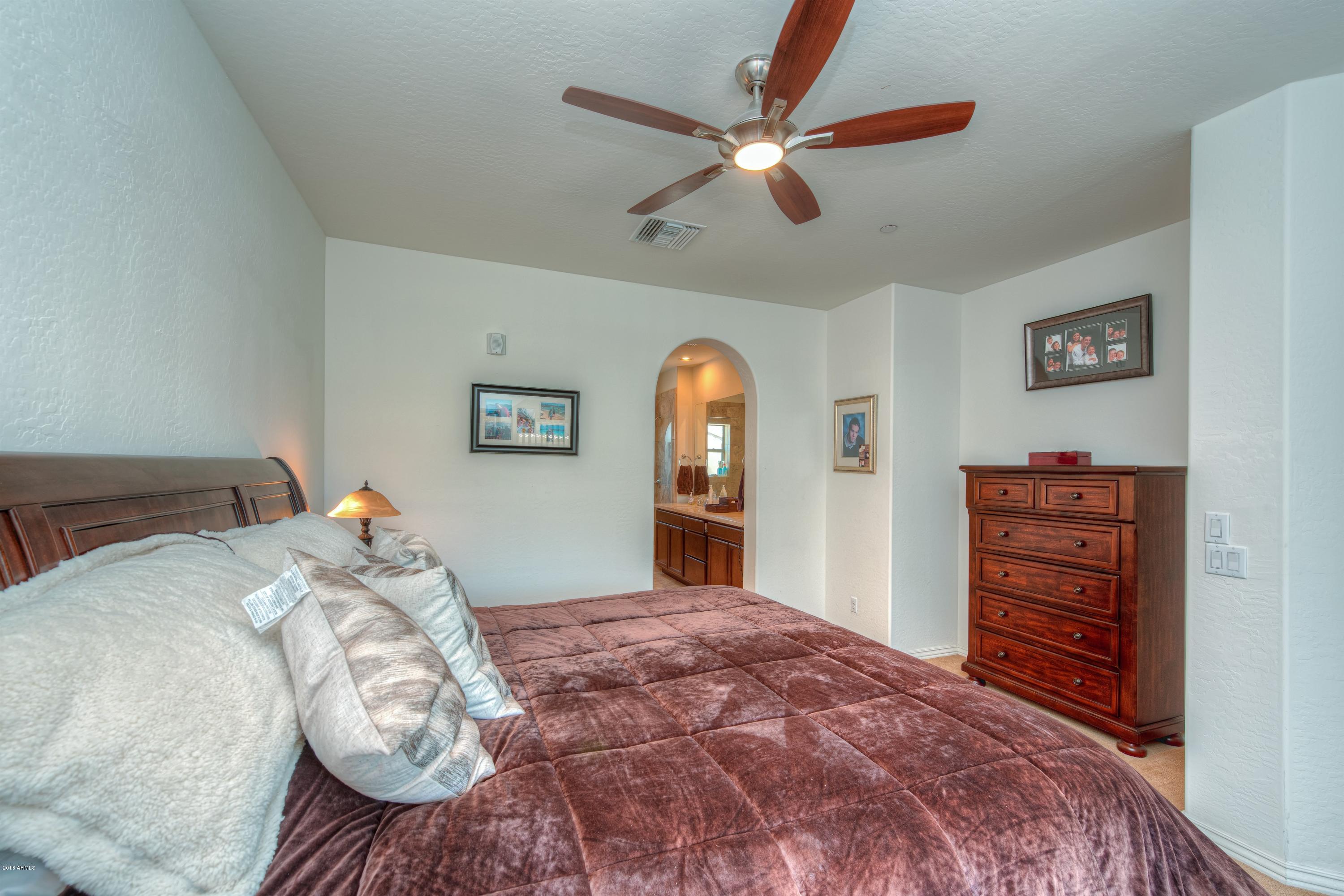 3935 East Rough Rider Road, Unit 1257 Phoenix, AZ 85050 - Photo 14 of 21 014_Master Bedroom