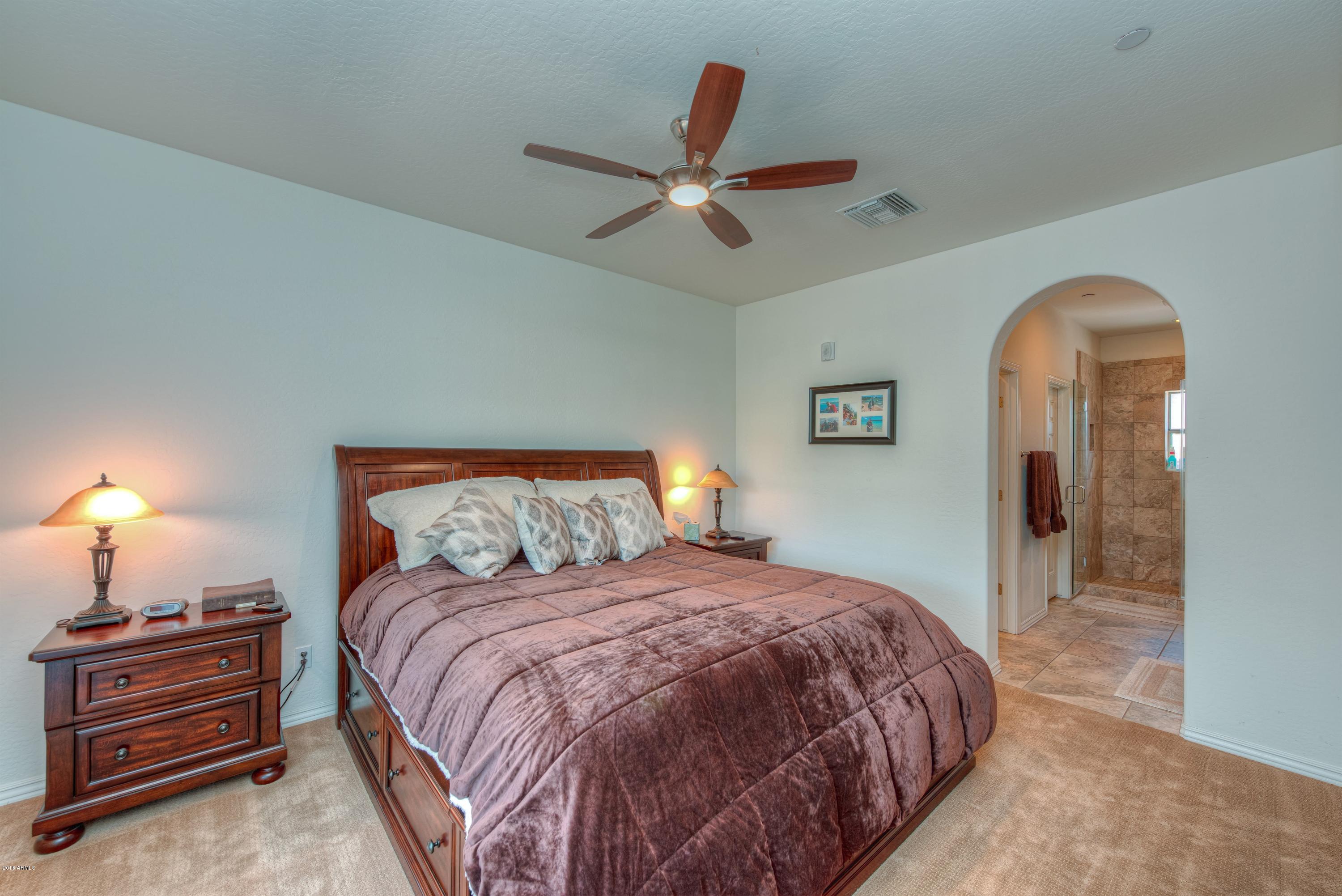 3935 East Rough Rider Road, Unit 1257 Phoenix, AZ 85050 - Photo 15 of 21 013_Master Bedroom