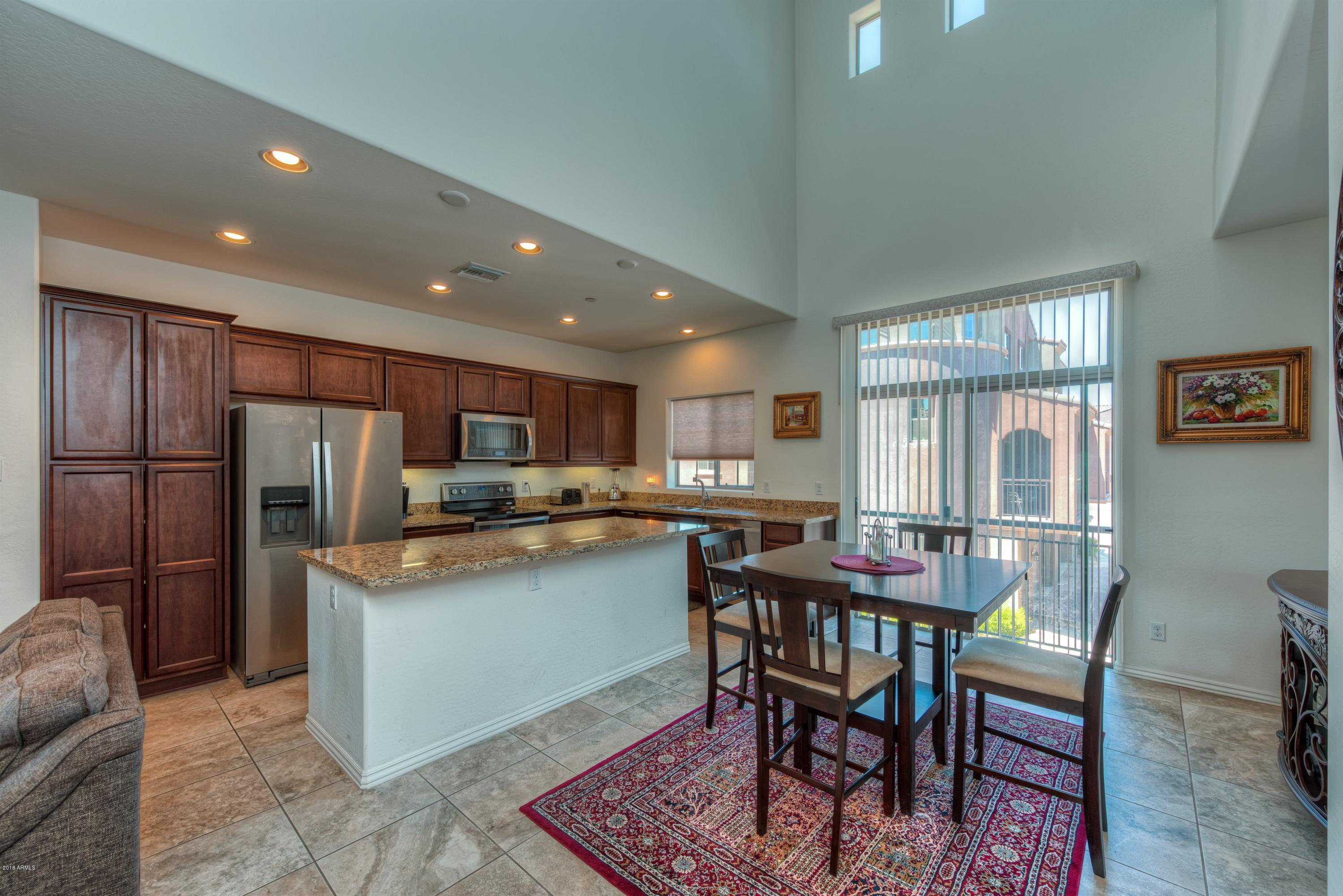 3935 East Rough Rider Road, Unit 1257 Phoenix, AZ 85050 - Photo 4 of 21 009_Dining and Kitchen
