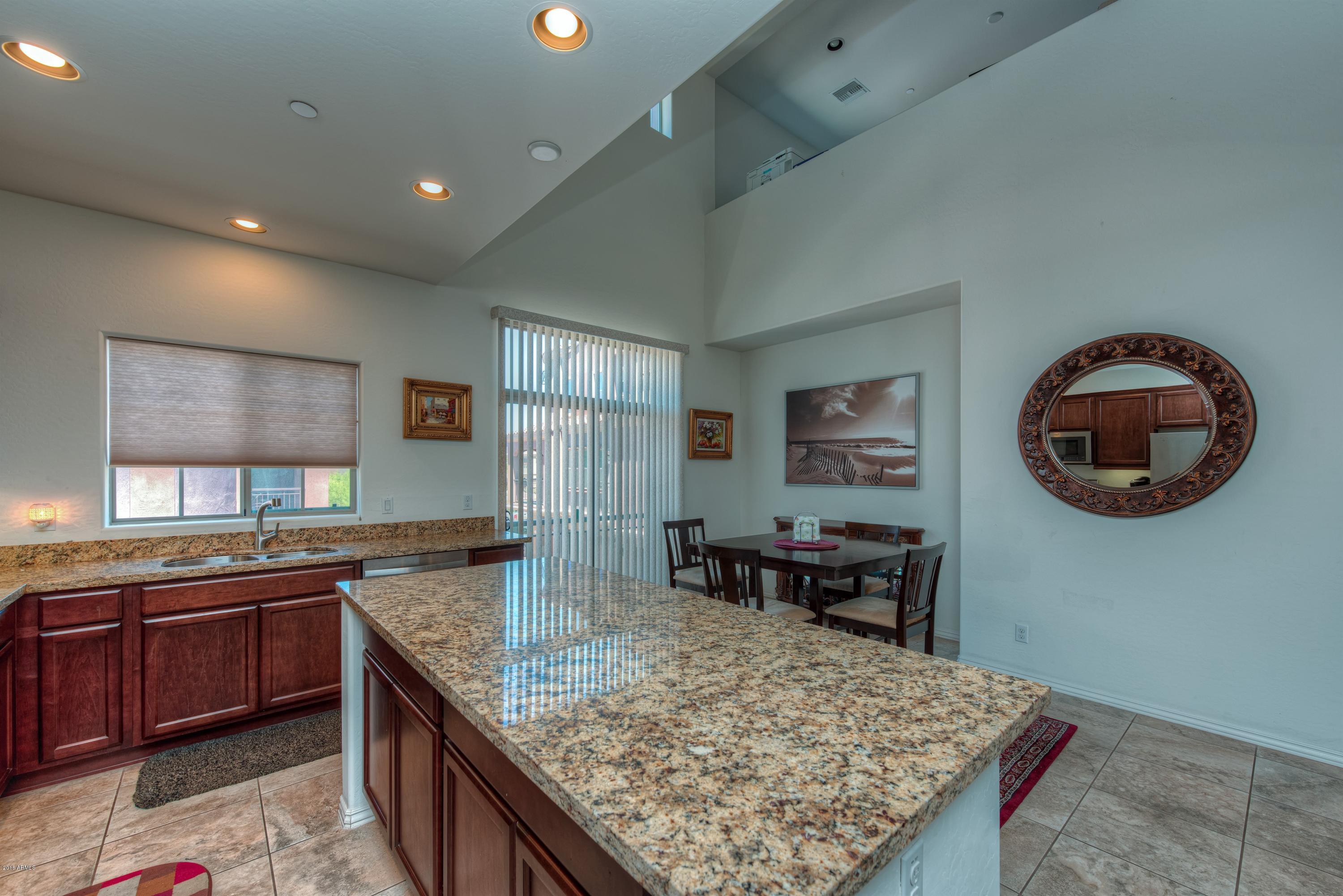 3935 East Rough Rider Road, Unit 1257 Phoenix, AZ 85050 - Photo 6 of 21 011_Kitchen and Dining