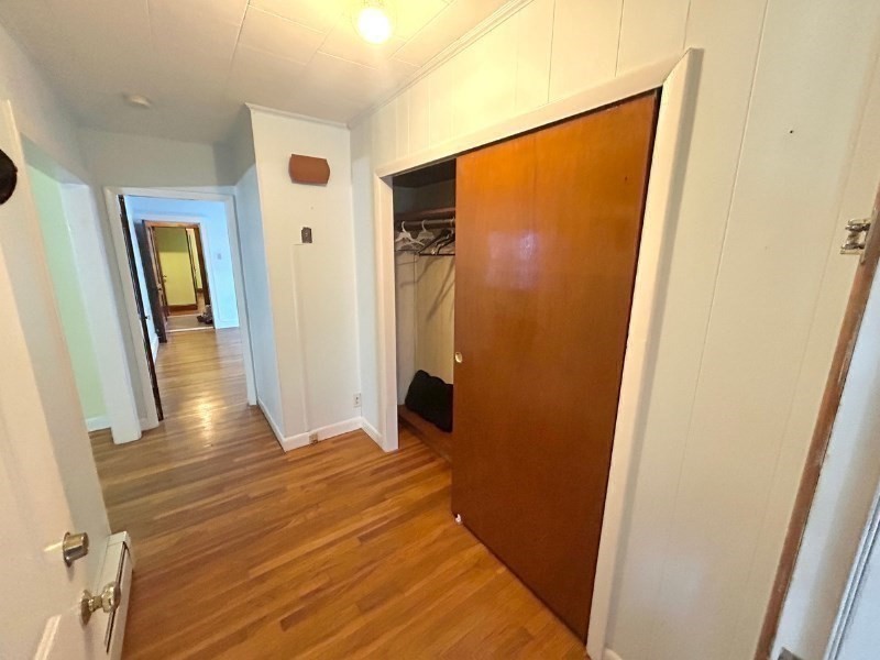 119 Bailey Road, Unit 1 Somerville, MA 02145 - Photo 23 of 25 a view of gallery with wooden floor