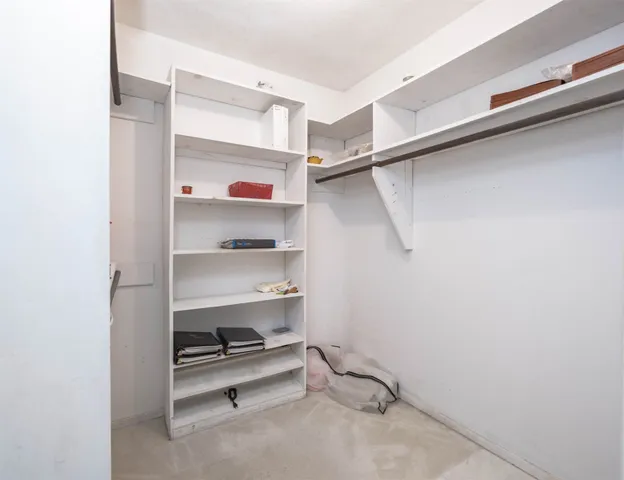 a view of empty room with windows