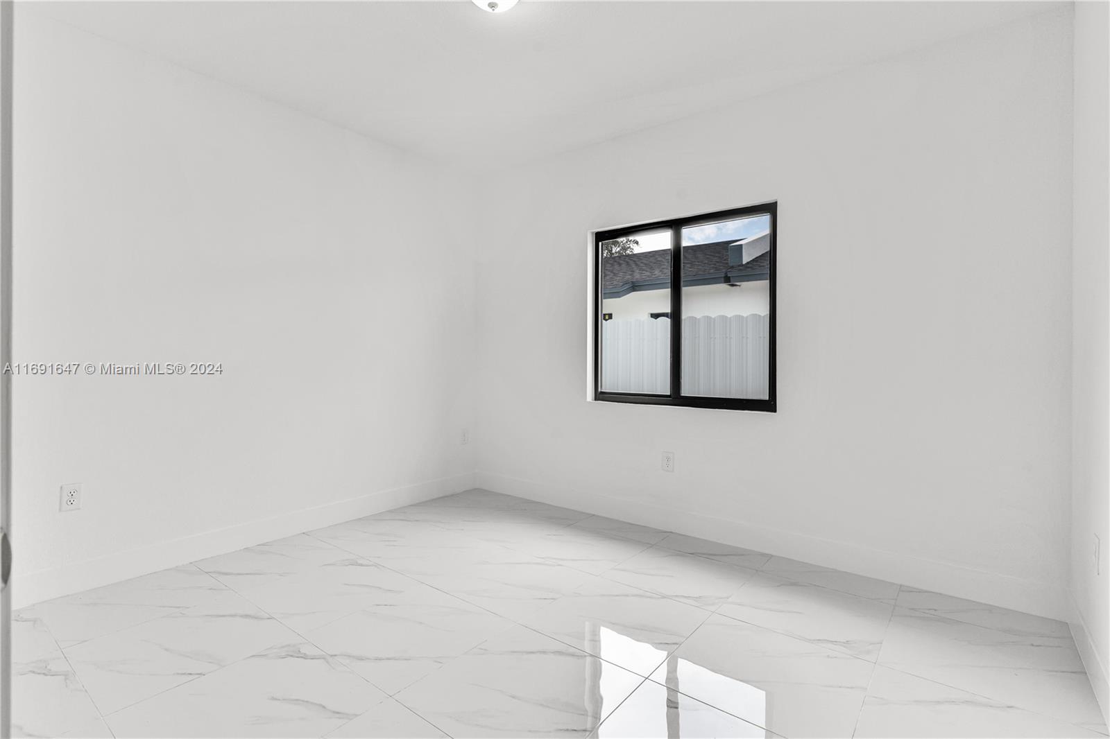 11970 Southwest 213th Street, Unit 1 Miami, FL 33177 - Photo 15 of 36 a view of an empty room