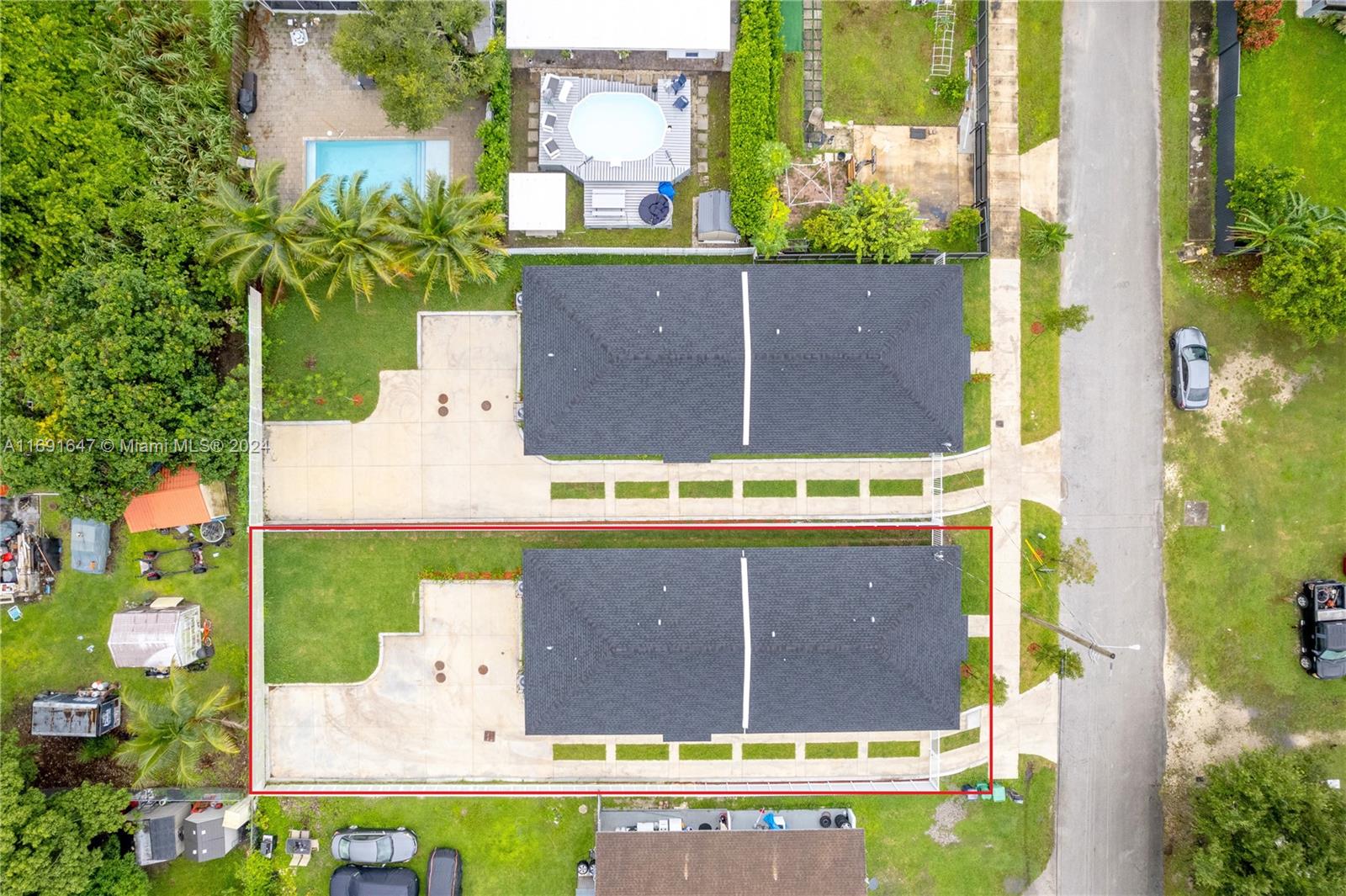 11970 Southwest 213th Street, Unit 1 Miami, FL 33177 - Photo 33 of 36 a view of swimming pool with a yard