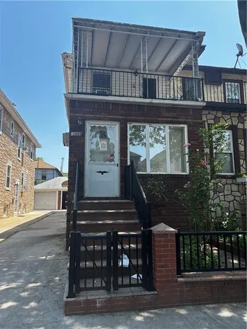 a front view of a building with glass windows