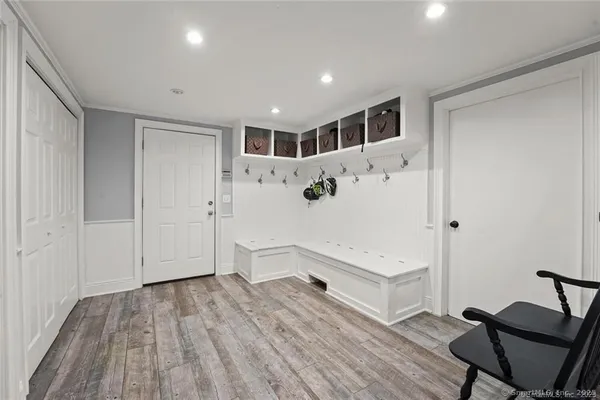 a view of kitchen with furniture and wooden floor