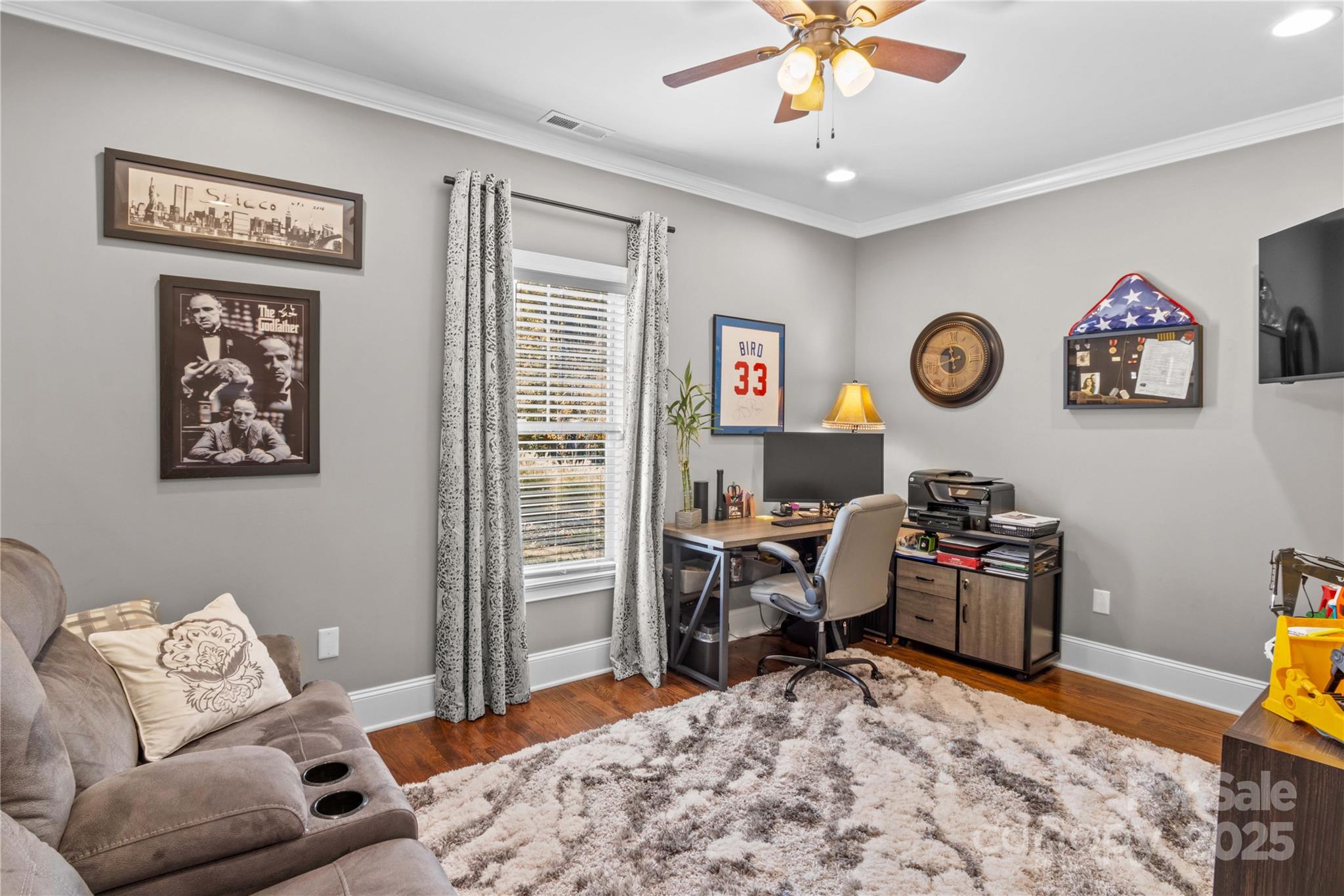 8612 Amandine Way Terrell, NC 28682 - Photo 20 of 48 a view of a livingroom with workspace and a couch