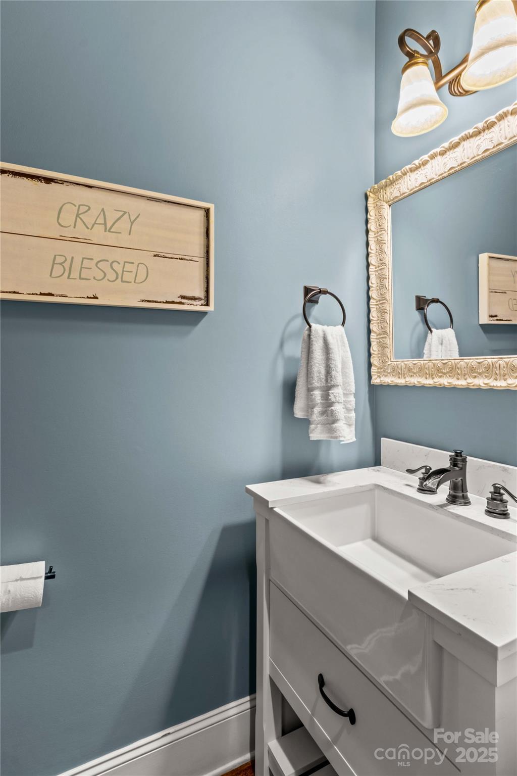 8612 Amandine Way Terrell, NC 28682 - Photo 21 of 48 a room with a sink and a mirror