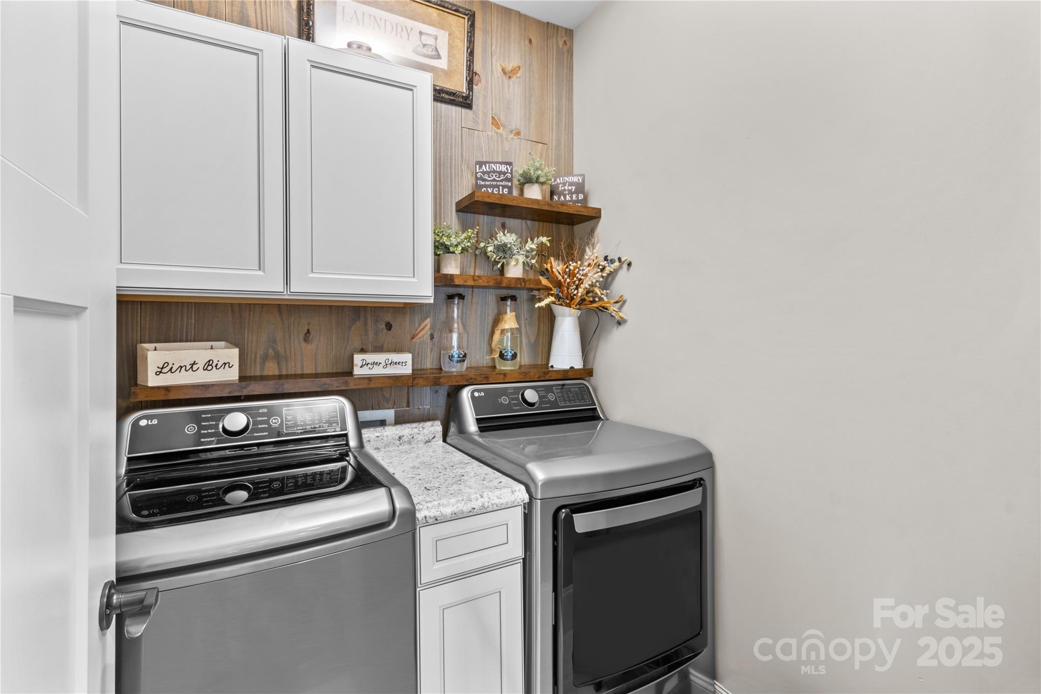 8612 Amandine Way Terrell, NC 28682 - Photo 28 of 48 a kitchen with a stove and cabinets