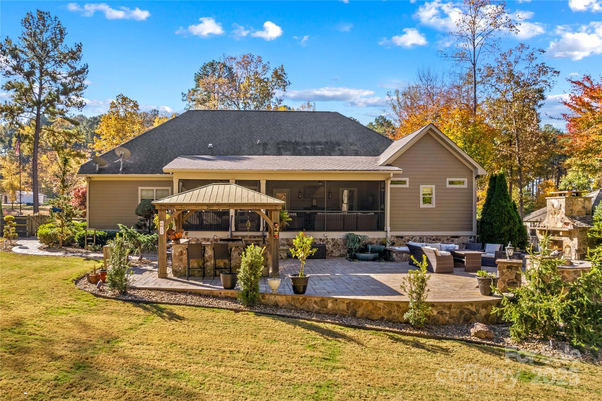 8612 Amandine Way Terrell, NC 28682 - Photo 40 of 48 a view of a house with swimming pool and sitting area