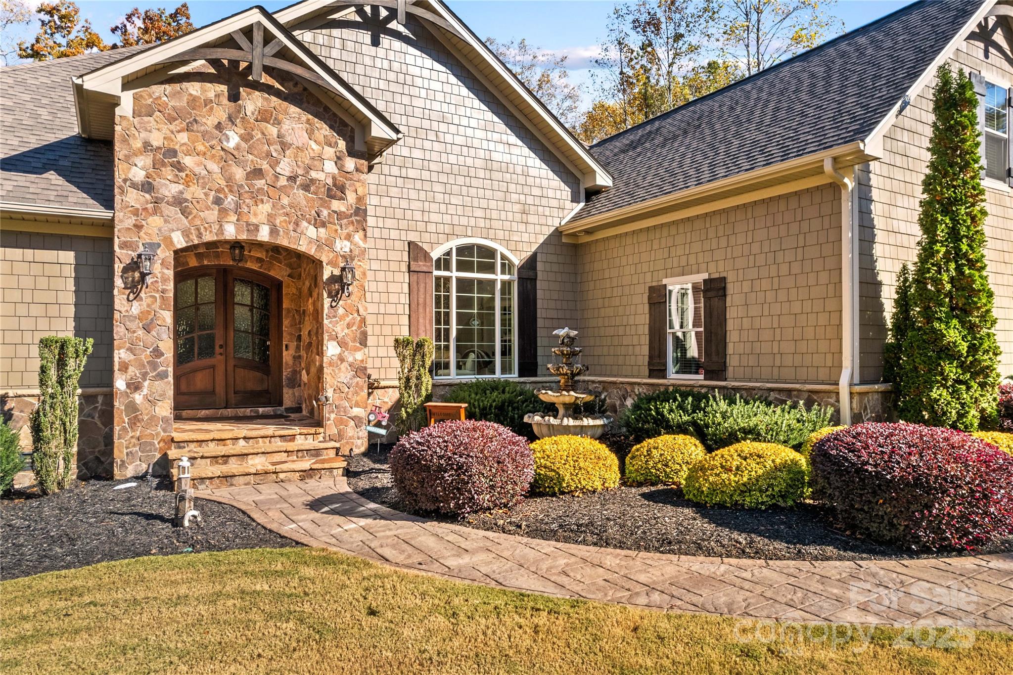 8612 Amandine Way Terrell, NC 28682 - Photo 5 of 48 a front view of a house with garden