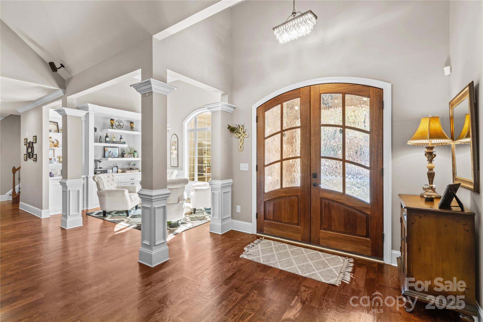 8612 Amandine Way Terrell, NC 28682 - Photo 6 of 48 a view of an entryway with wooden floor and a fireplace