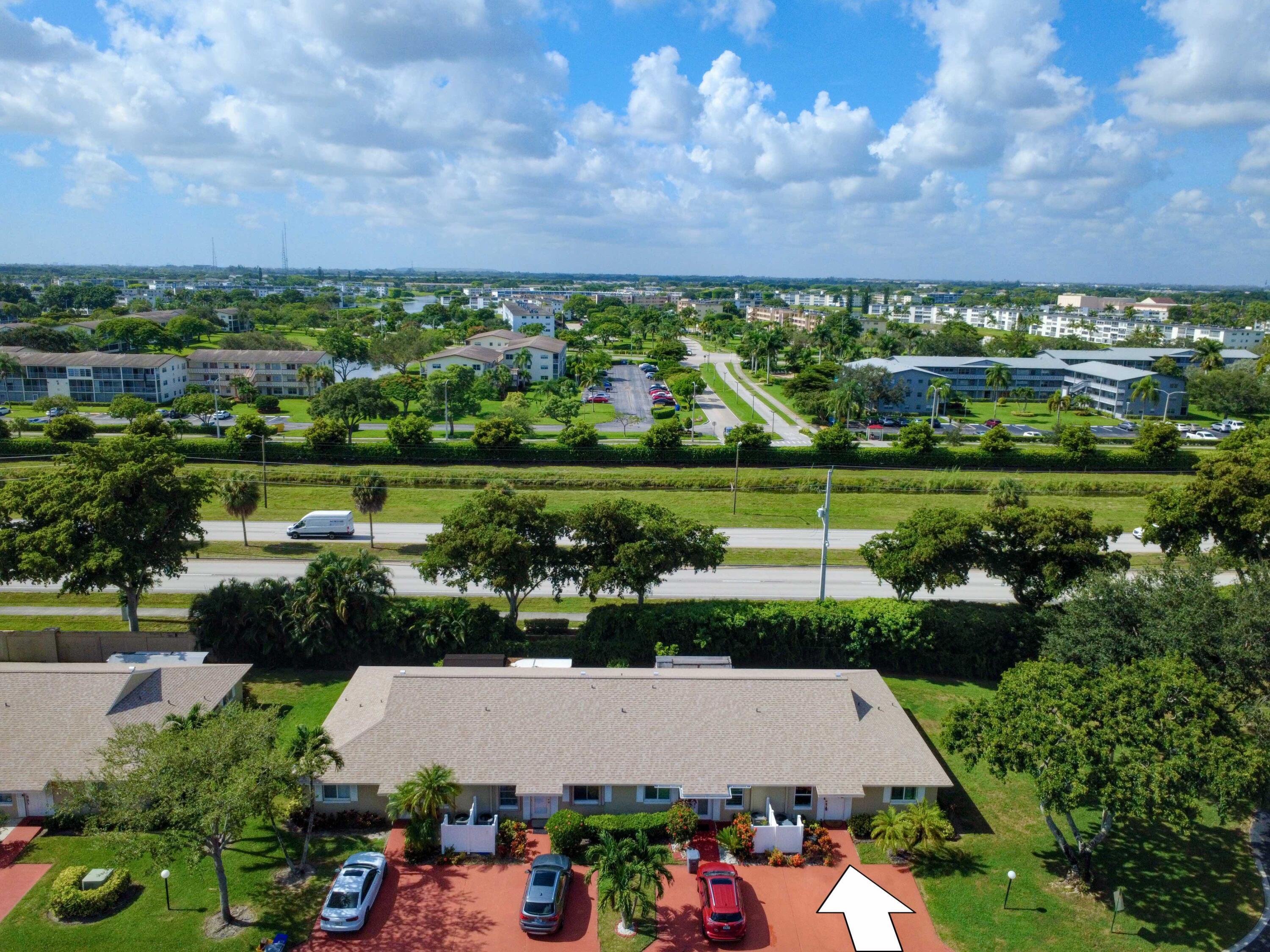 8652 Overset Lane Boca Raton, FL 33496 - Photo 29 of 42 Drone Front Arrow to Unit