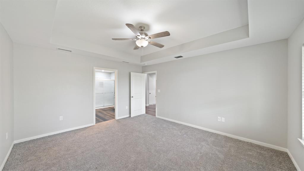 207 East McCoulskey Street Terrell, TX 75160 - Photo 16 of 29 a view of an empty room with a fan