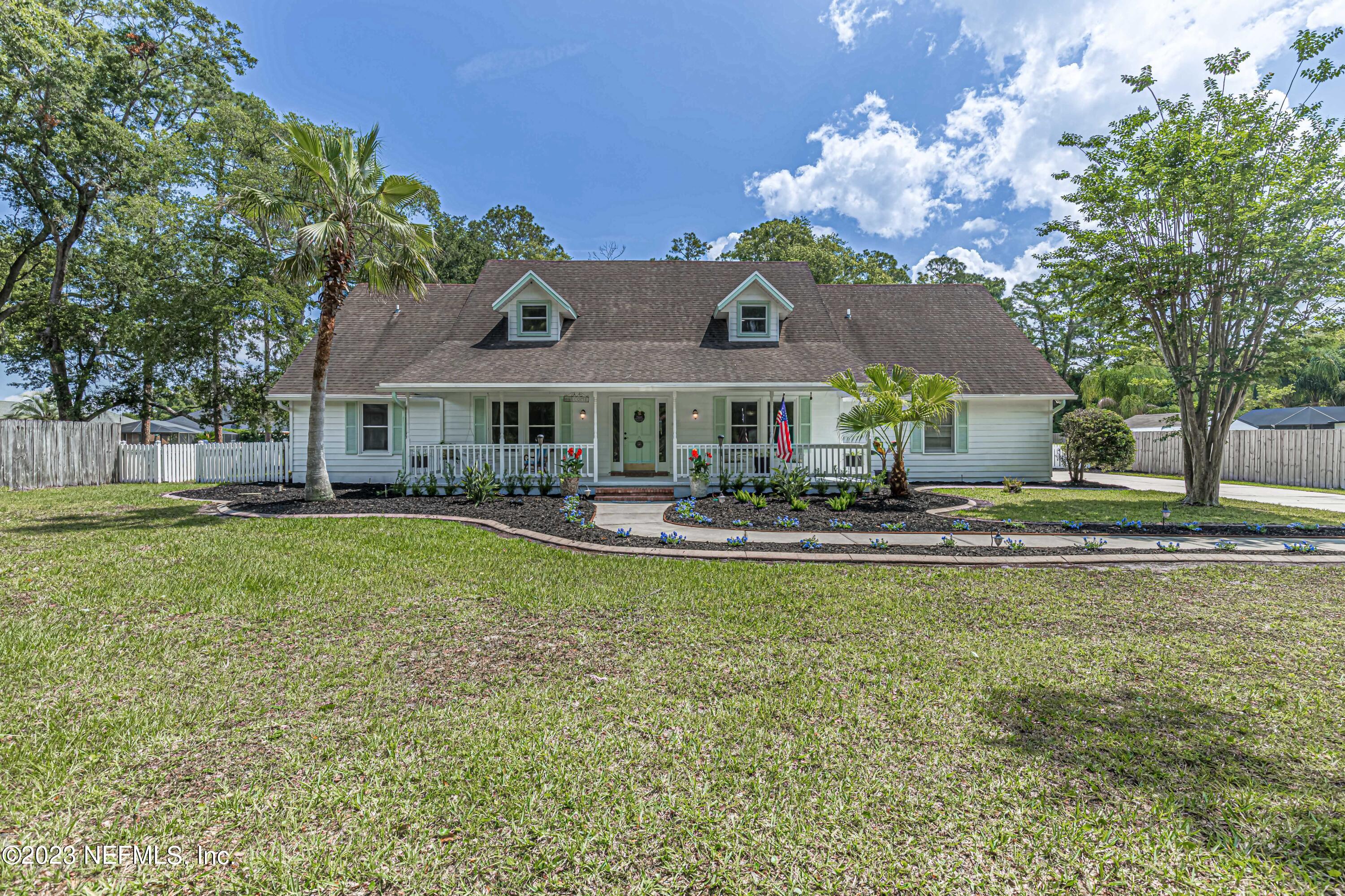 520 Roberts Road St. Johns, FL 32259 - Photo 1 of 81 a front view of a house with swimming pool having outdoor seating